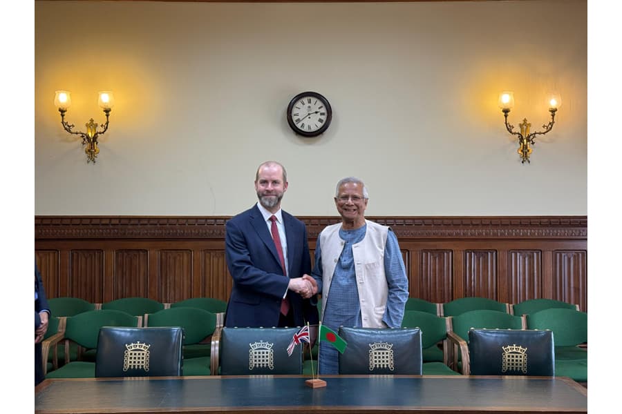 British Business Secretary Jonathan Reynolds meets Prof Yunus