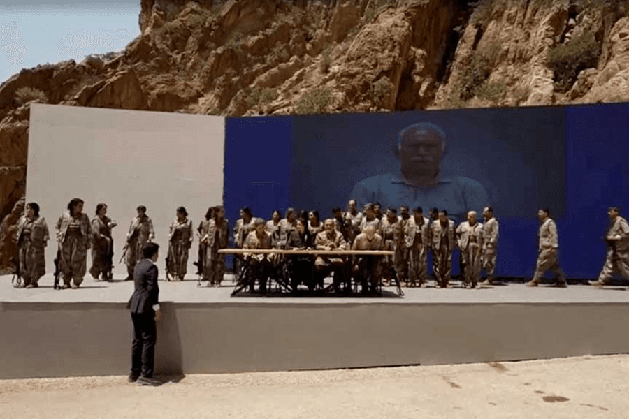 Kurdish PKK militants burn weapons in Iraq to launch disarmament