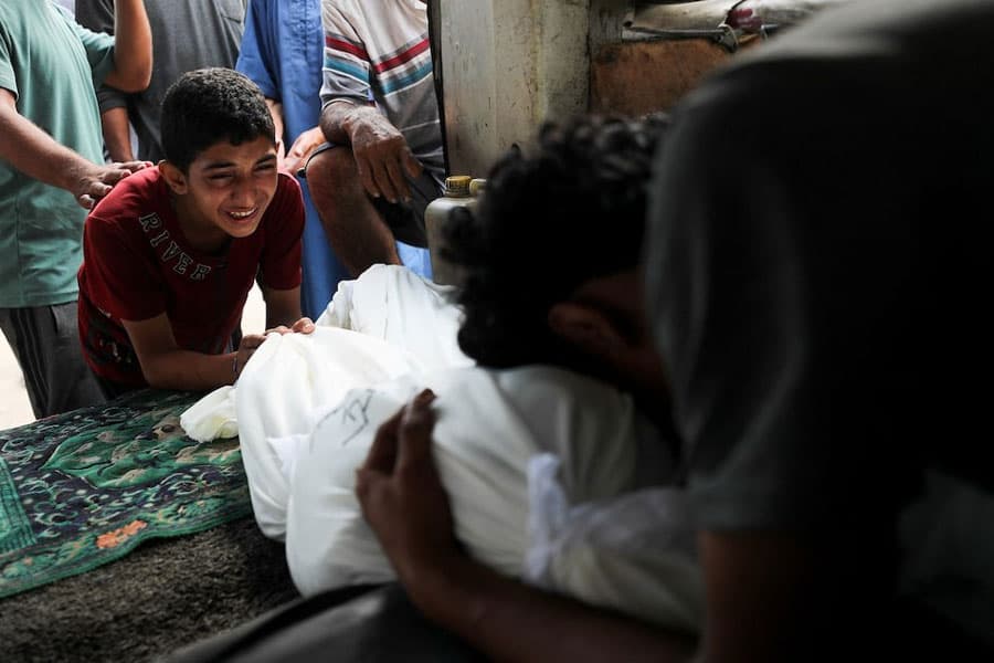 At least 32 killed by Israeli fire while seeking aid in Gaza, hospital says