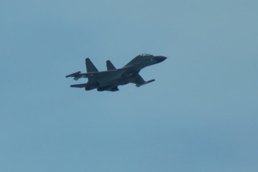 Chinese fighter 'intercepts' Philippine plane over disputed shoal, Manila says