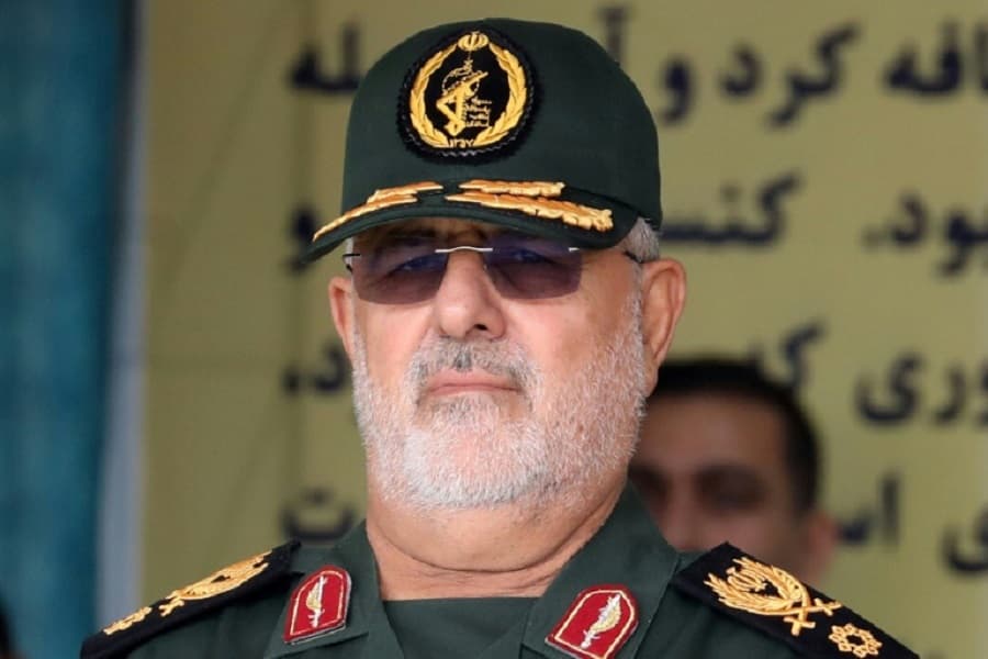 Iran says ‘finger on trigger’ as Trump claims Tehran wants talks