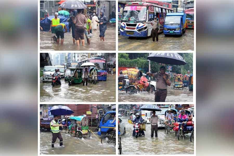 Traffic police struggle to regulate traffic movement in deluged Dhaka