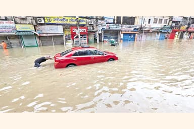 Dhaka deluged with torrential rain