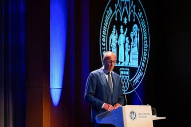 Germany pushes China currency talks, urges freer yuan