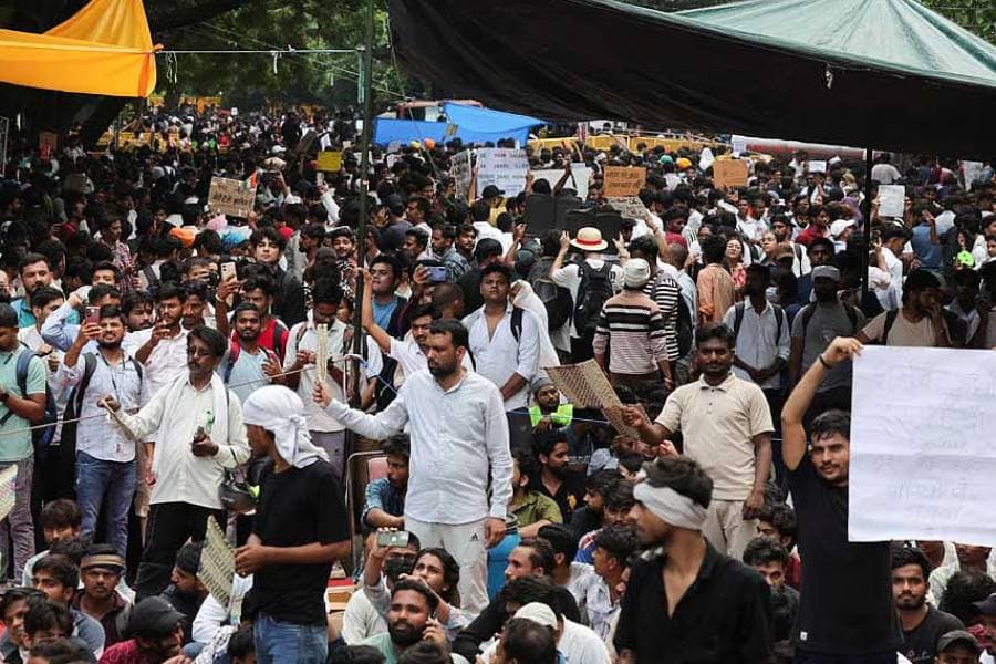 India's Modi promises fast-track courts on exam leaks, protesters want minister to quit