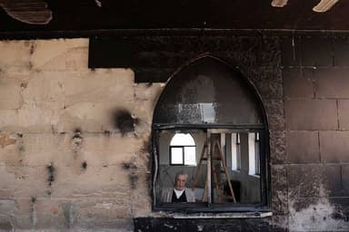 Israeli settlers set fire to West Bank mosques after deadly clash