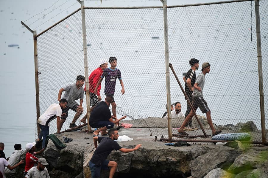 Spain says migrants are returning from Ceuta after 57 killed in border rush