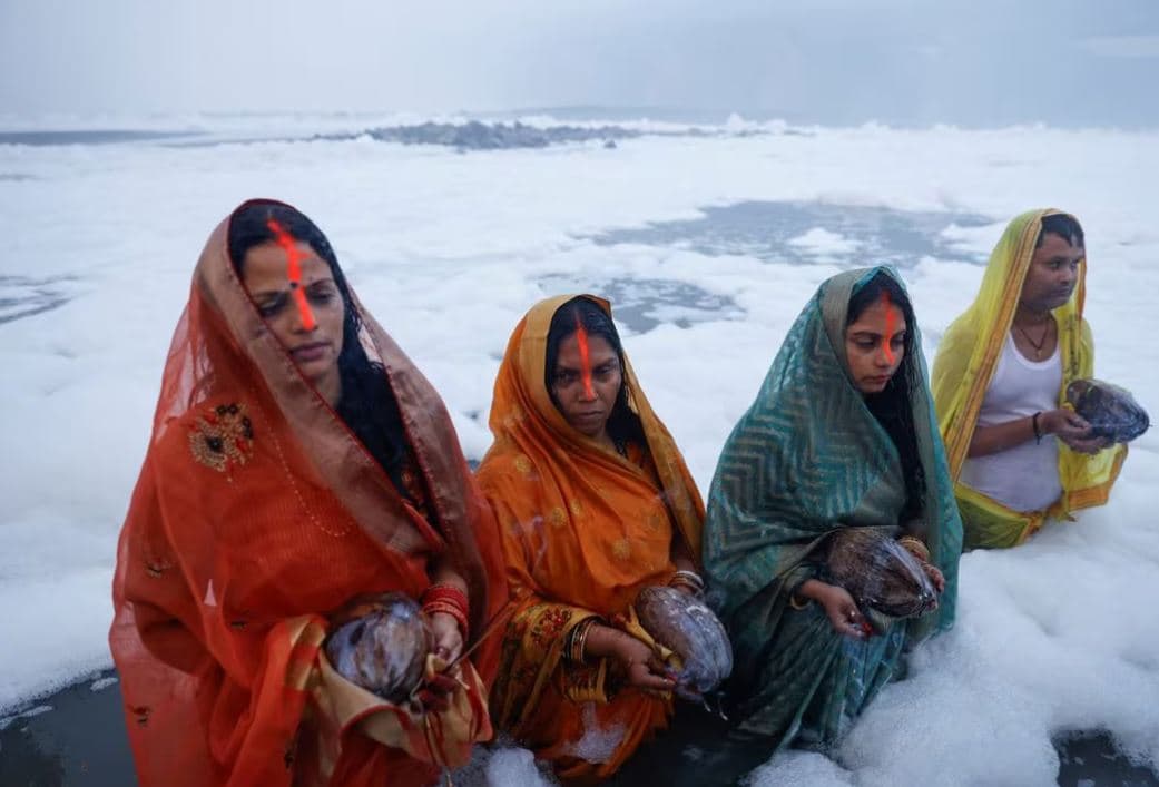 Indian capital resumes some activities despite hazardous air, river foam