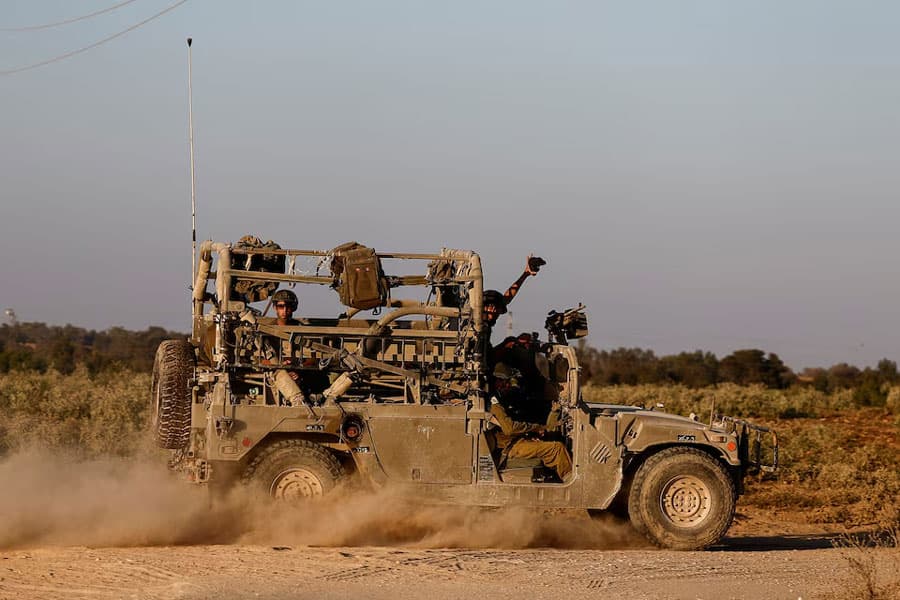 Israel carries out new raids in Gaza as Netanyahu visits US