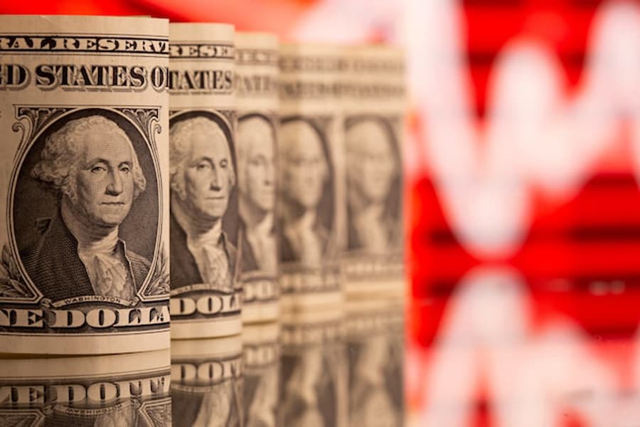 Dollar jumps, stocks retreat after Trump vows tariffs