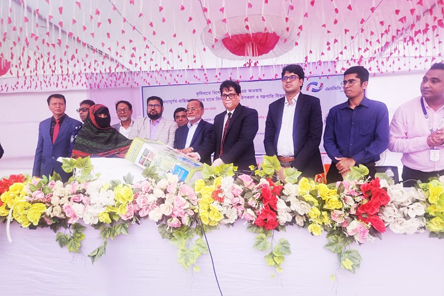 NCC Bank distributes agricultural materials, machinery to marginal farmers in Feni