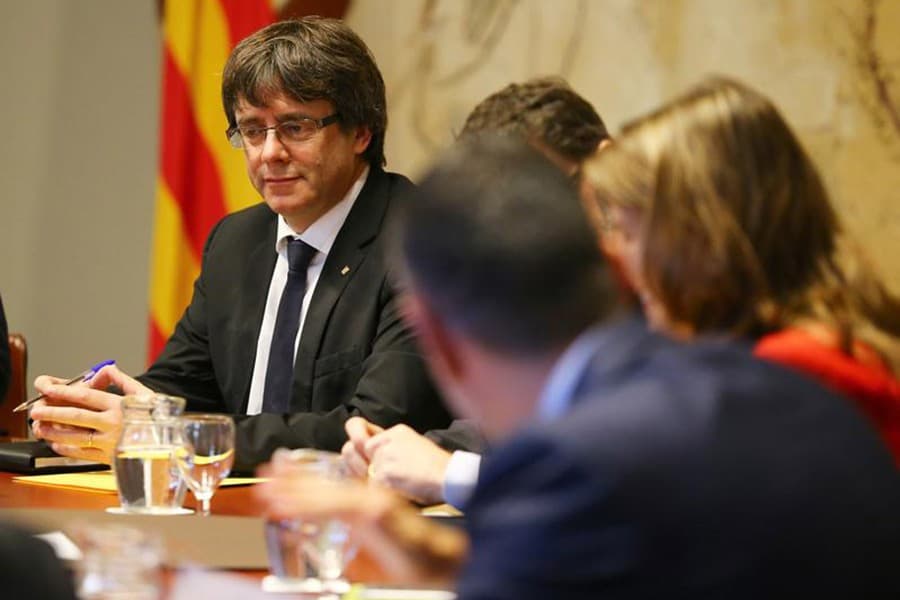 Catalan leaders flee to Brussels
