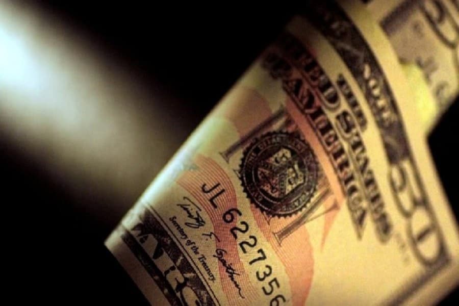 Dollar under pressure as investors fret over US tax plans