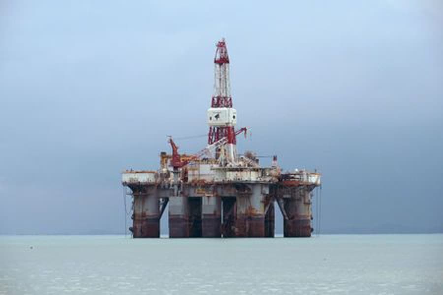 Oil dips on rising US fuel stocks, but OPEC's supply cuts support market