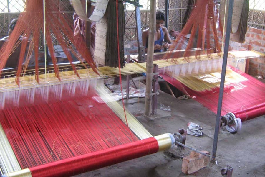 Hundreds of vulnerable women weave  Benarasi sarees to support families