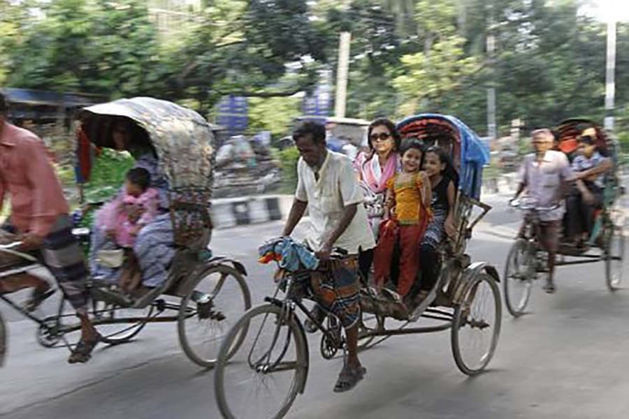 Slow moving rickshaws choking traffic