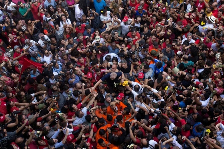 Lula turns himself in to Brazil police, ending standoff