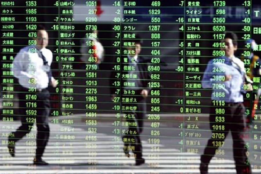 Asian stocks rise on strong US earnings; BOJ stands pat