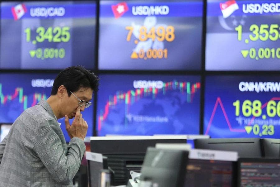 Asian shares mixed after US stocks retreat