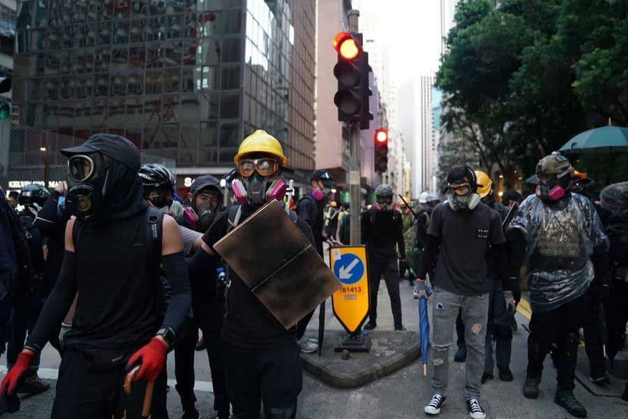 Unrest-hit Hong Kong outlaws wearing masks in protests