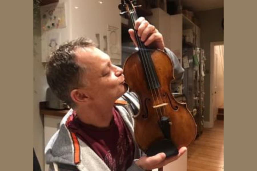 Musician reunited with £250,000 violin