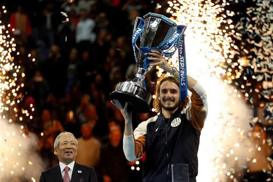 Tsitsipas comes from behind to win ATP Finals title