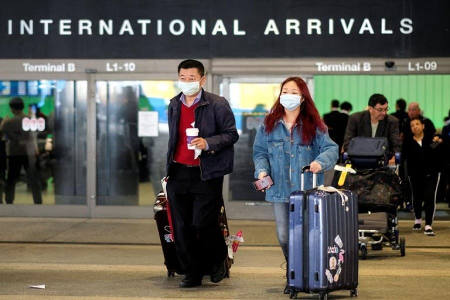 Airlines cut China flights as companies restrict travel on virus fears