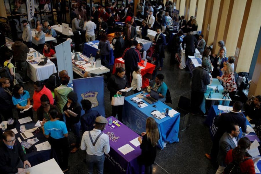 US weekly jobless claims surge to record 3.28 million