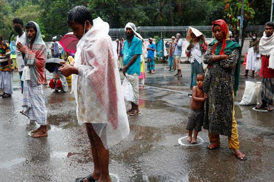 'Should I buy a mask or food?' – poor people of South Asia face stark choice