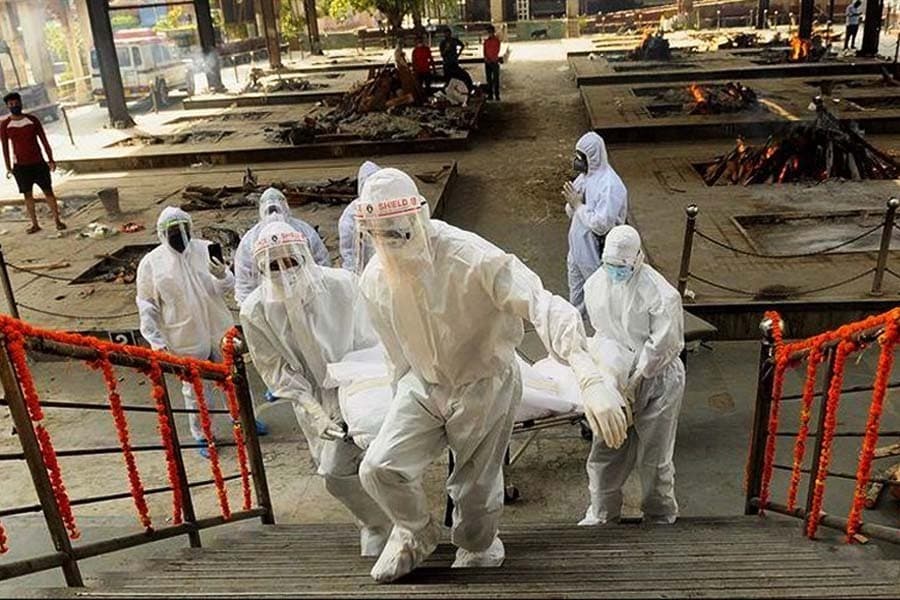 India's Covid-19 death toll passes 20,000 as infections surge