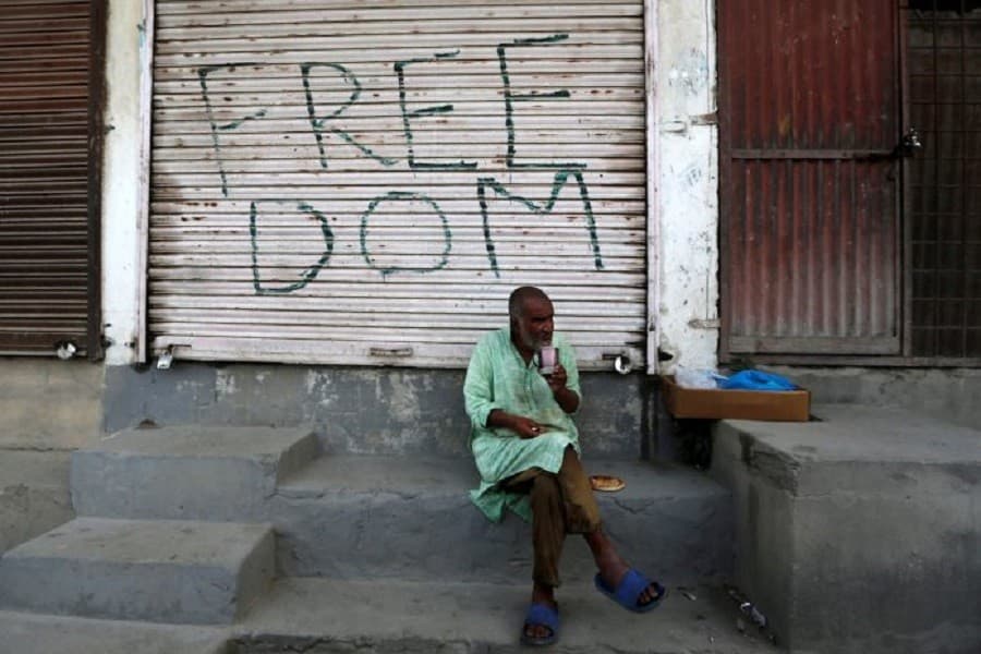 With a heavy hand, India rides out Kashmir's year of disquiet
