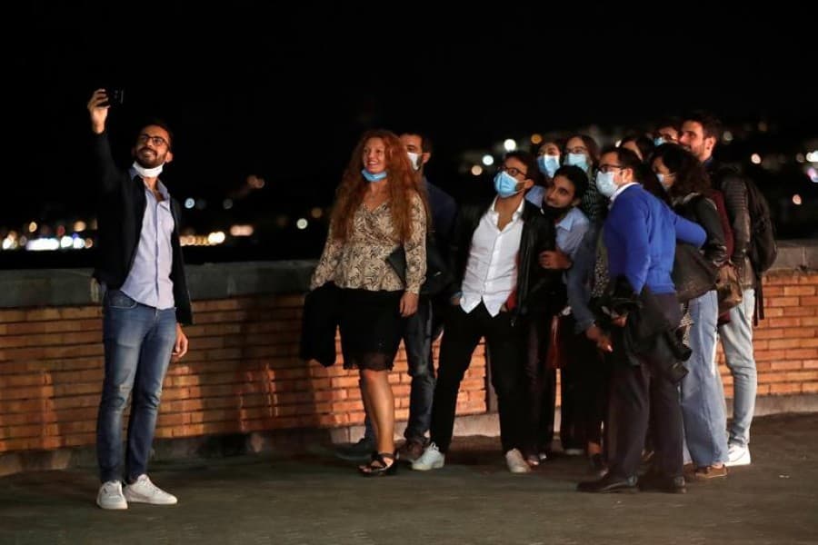 Italy makes masks mandatory outdoors as coronavirus rebounds