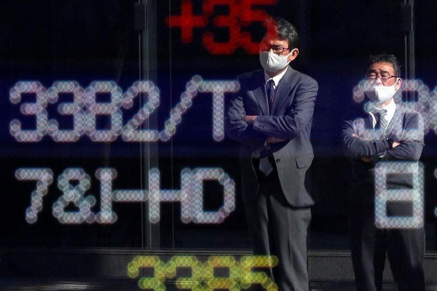 Asian shares gain on vaccine rollout hope