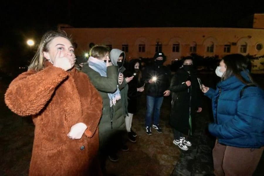 Russians show Valentine's Day support for detained Navalny with candle-lit vigils