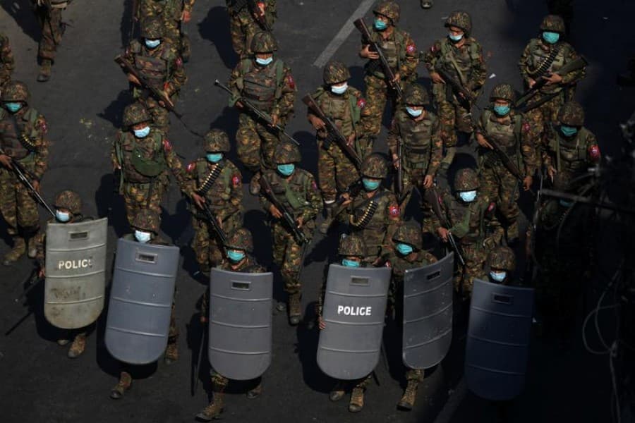Myanmar police fire stun grenades to disperse protesters as Southeast Asian ministers aim for talks