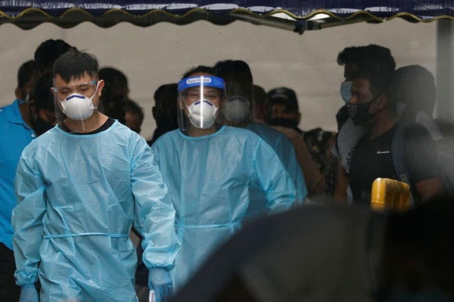 Singapore quarantines over 1,100 migrant workers after virus cases found in dormitory