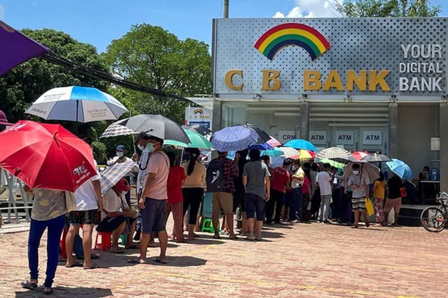 Myanmar's crumbling economy runs low on cash