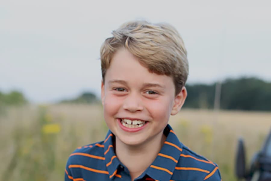 Britain's Prince George marks eighth birthday with a grin