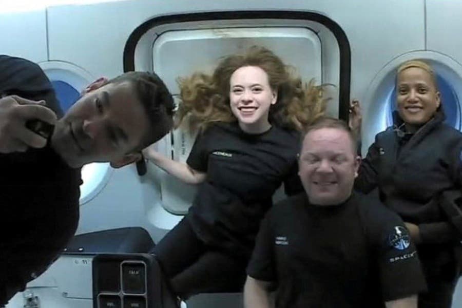 History-making space tourists return to earth safely