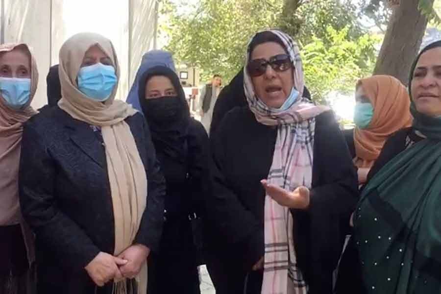 Afghan activists protest outside shuttered women affairs ministry