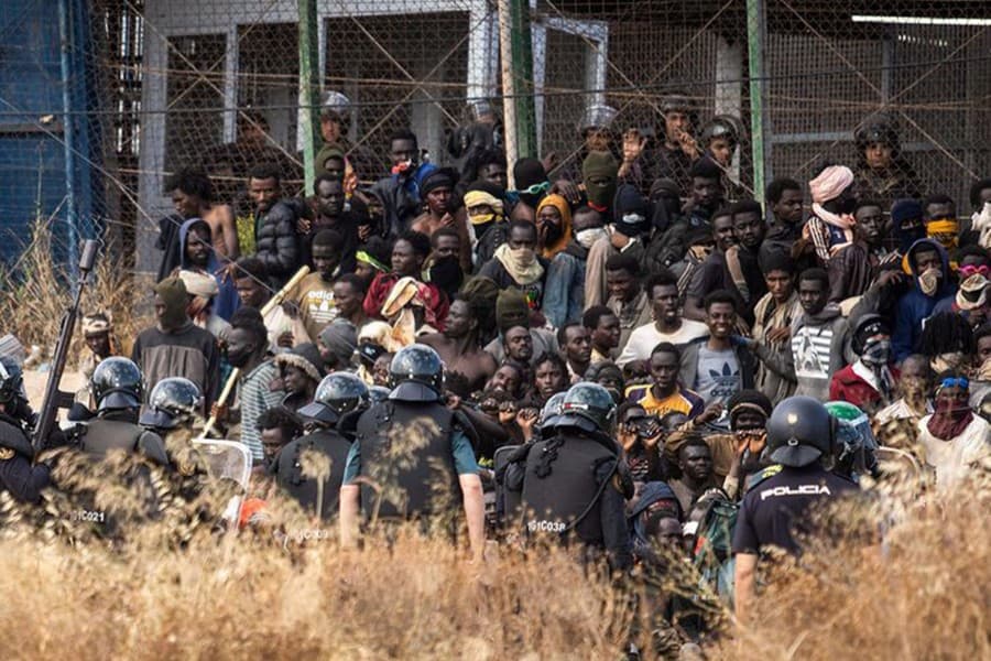Morocco says 18 migrants died during mass crossing into Spanish enclave