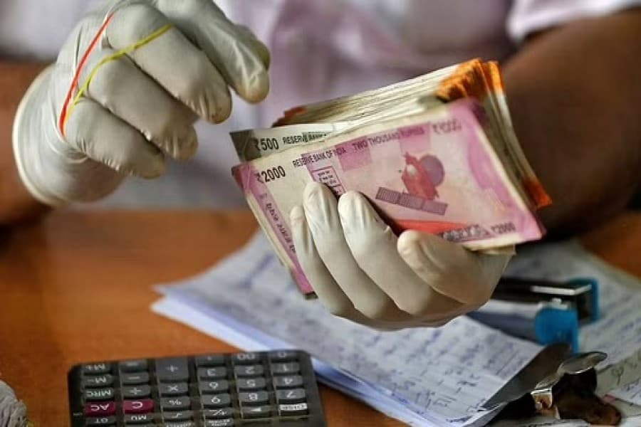 Moderately hawkish RBI to keep India rupee supported, analysts say