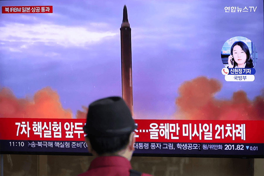 N Korea fires missile over Japan, stopping trains and sparking warning message