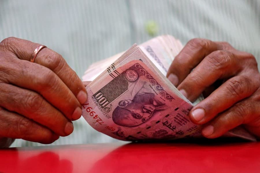 No peace for India's rupee as mighty dollar thunders on: Poll