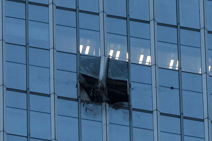 Pilot killed, 13 injured after small plane crashes into Beijing high-rise
