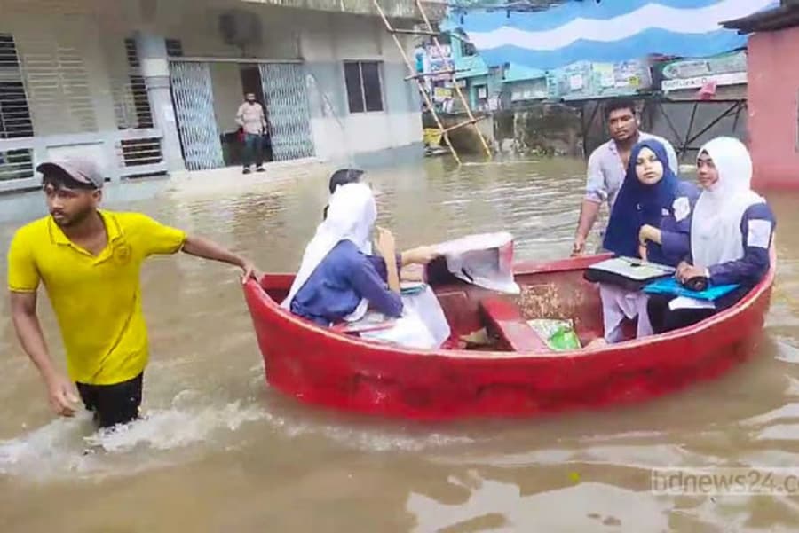 Waterlogging in Cumilla: HSC examinees use boats to reach centres