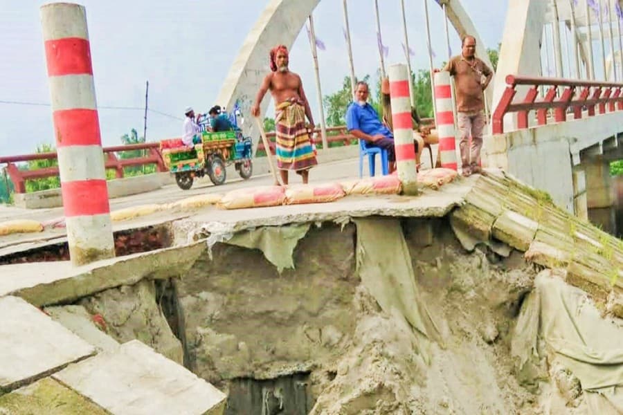 Approach road collapses after several days of rain