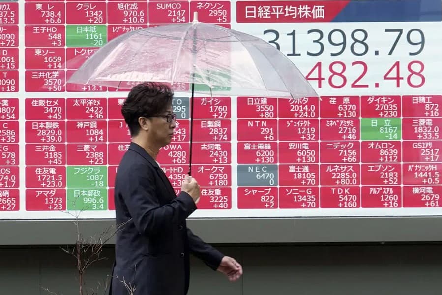 Asian stocks mostly higher after Biden-McCarthy deal on US debt