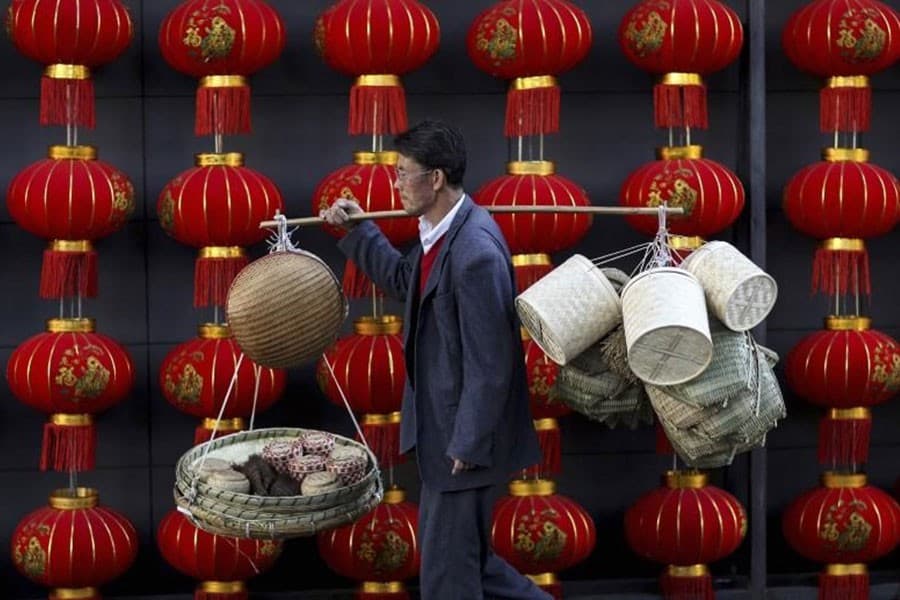 China's business activity falls to 21-month low in September