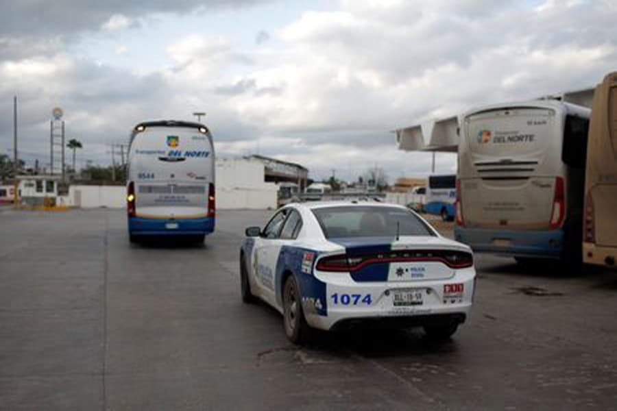 US sends first families to Mexico to await asylum, rights groups sue
